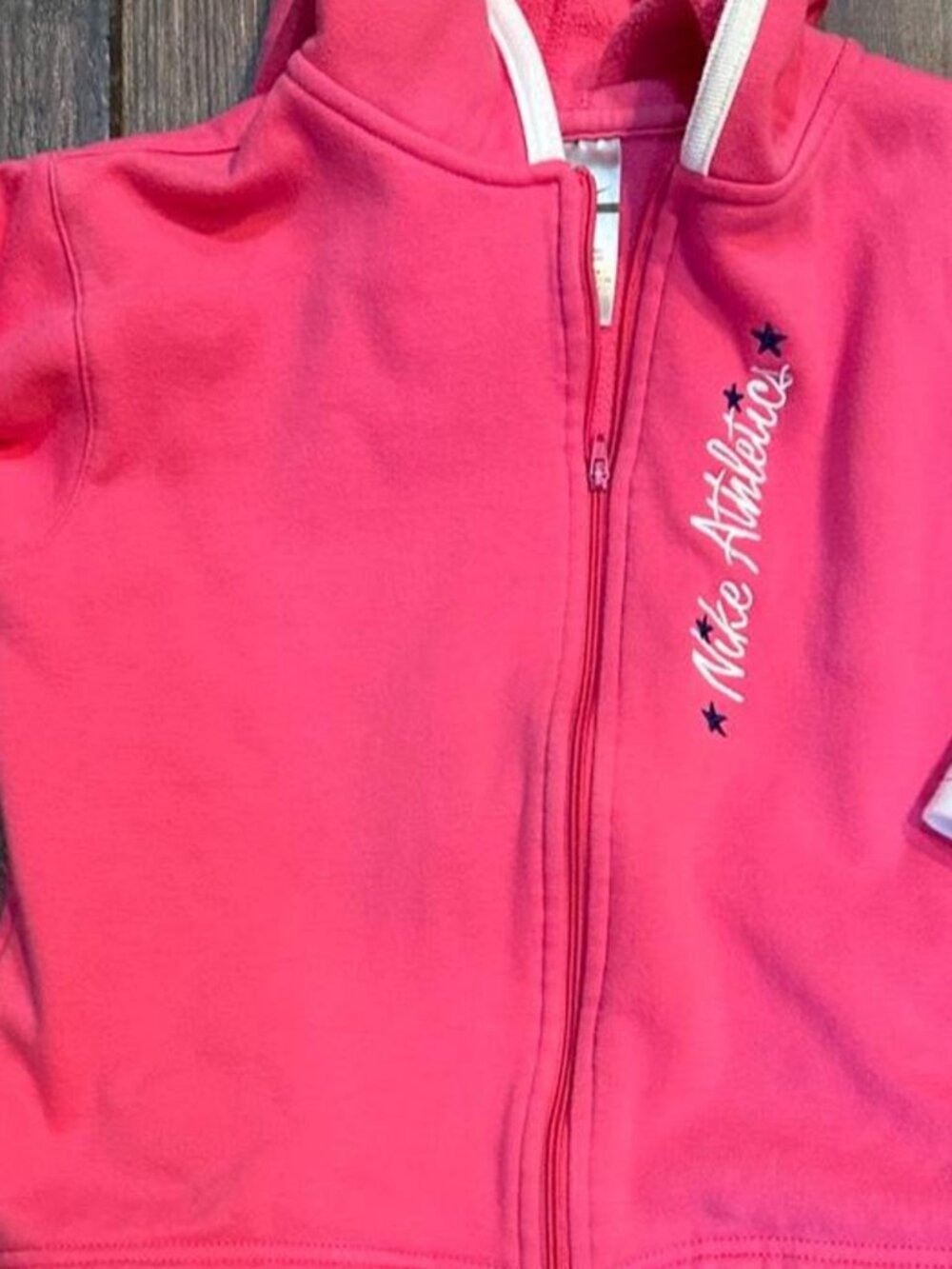 Nike girl’s pink zip up jacket with white accents. Size: 8 years #kids #athletic